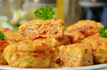 Baked cupcakes with cheese on a plate