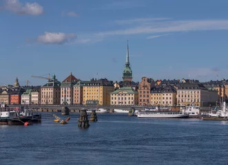 Poster Bridge and bay at the old town Gamla Stan, a summer day in Stockholm, Sweden 2022-07-03 © Hans Baath