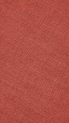 Pale red woven surface closeup. Linen net texture. Dark fabric background. Textured len phone wallpaper
