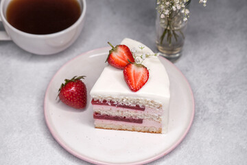Strawberry homemade cake decorated with gypsophila sprigs