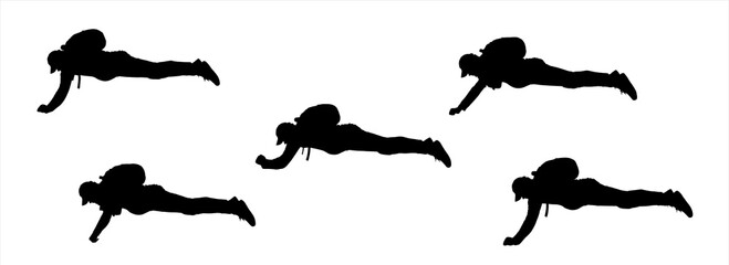 An athletic guy in a lying position with a backpack on his back. Rescuer. Skydivers in flight without an open parachute. A series of silhouettes of a man lying on his stomach. Isolated on the white