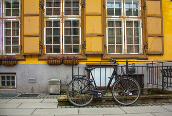 Fototapeta na wymiar Bicycle Near Old House In Old Part Town in Tallin, Estonia