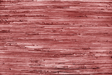 close up of the red bamboo grass wicker wall background