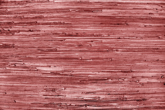 close up of the red bamboo grass wicker wall background