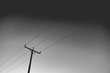 pole and wires at night