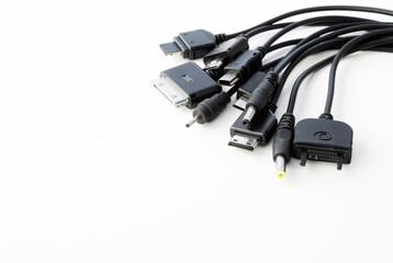 different types of charger connectors for phones, on a white background