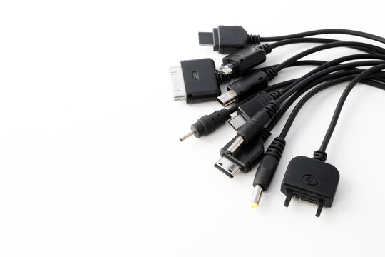 different types of charger connectors for phones, on a white background