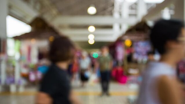 Time lapse of blurred people in exhibition hall