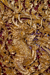 Traditional Thai style art on temple's wall, Thailand