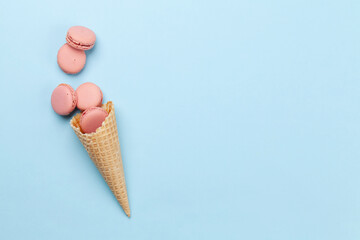 Various macaroon cookies in ice cream cones