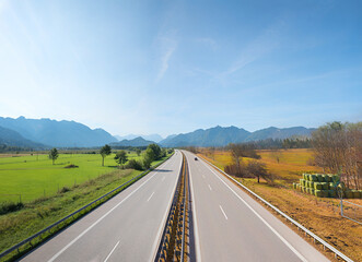 highway to the bavarian alps, green and dry side, composition climate change