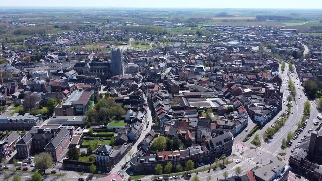 Aerial circling over Tongeren city on sunny day, Belgium