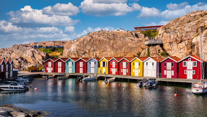 Colorful boathouses in Smögen on the Swedish West Coast. - obrazy, fototapety, plakaty