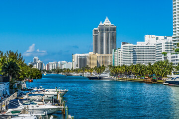 Fototapeta na wymiar Flamingo Waterway Reflections Apartment Buildings Miami Beach Florida