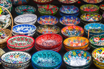 Mediterranean style ceramic bowls displayed at Brick Lane street market in London, England