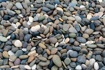 Stones to decorate the garden in front of the house Many sizes and different colors