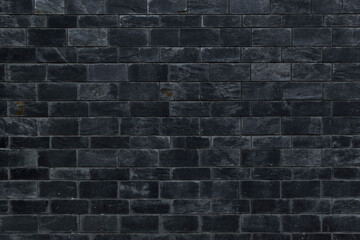 Muro de construcción oscuro casi negro como textura de fondo o textura urbana