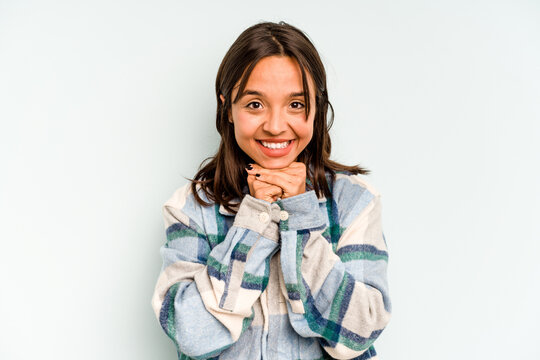 Young Hispanic Woman Isolated On Blue Background Upset Screaming With Tense Hands.