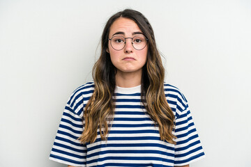 Young caucasian woman isolated on white background sad, serious face, feeling miserable and displeased.