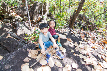 Thai sister and brother in the wood