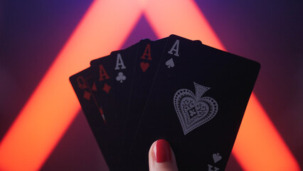 Female person hand with double double ace poker win cards close-up
