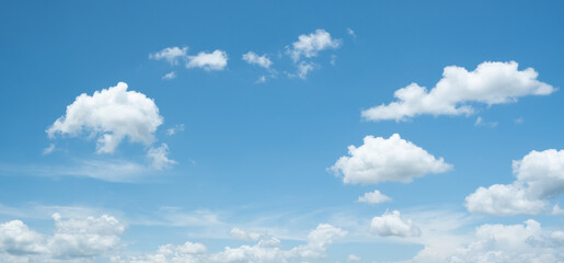 Naklejka na ściany i meble Many small clouds in blue sky.Summer cloudy.White clouds floating in the sky
