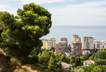 Durres, Albania - September 2021: Sunny, summer panoramic view of modern buildings and the harbour of Durres, Albania