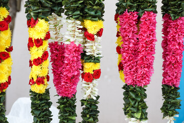 Indian traditional wedding garlands in shop for sale	
