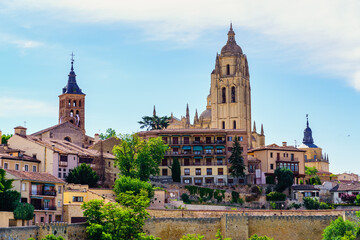 Skyline of the city of Segovia with its medieval buildings rising to the sky.