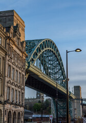 The Tyne Bridge during the Blue hour, surrounded by the beautiful architecture of Newcastle, England