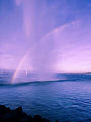 Pink rainbow below Jet d'Eau water fountain