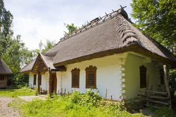 Fototapeta na wymiar Traditional Ukrainian house of the 17-18th century in Cossack village (museum) Mamaeva Sloboda in Kyiv, Ukraine