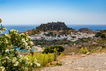 Fototapeta na wymiar View of Lindos and the ancient acropolis on the hill, Rhodes, Greece.