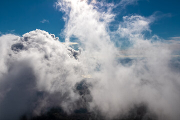 Obraz premium Panoramic view from volcano Mount Vesuvius on the cloudy bay of Naples, Province of Naples, Campania region, Italy, Europe, EU. Looking at the cloud overed island of Capri and Mediterranean coastline