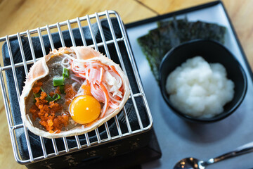 Japanese food, Krab boiled grill Kani Miso grill on the stove. © kannapon