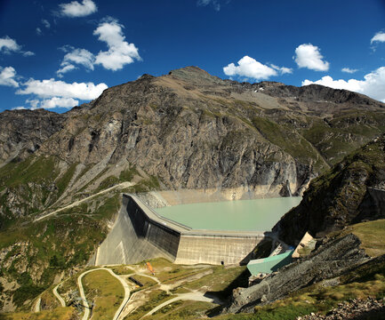 Dixence, H&eacute;r&eacute;mence sight from mountain lake Dix, Valais, Switzerland, swiss alps the biggest dam in Europe.