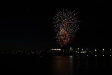 Fireworks shoot over Alamitos Bay in Long Beach to celebrate July 4th holiday.