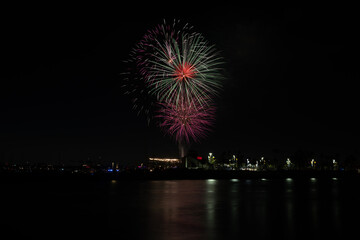 Fireworks shoot over Alamitos Bay in Long Beach to celebrate July 4th holiday.