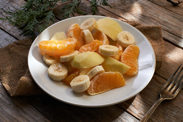 Fruit salad on rustic table