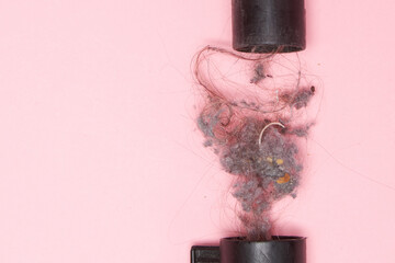 Vacuum cleaner clogged with garbage dirt and hair on a light background Dirt dust hair clogged in...