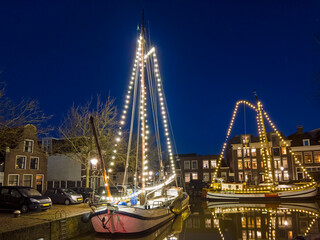 City scenic from Harlingen at night in the Netherlands in christmas time