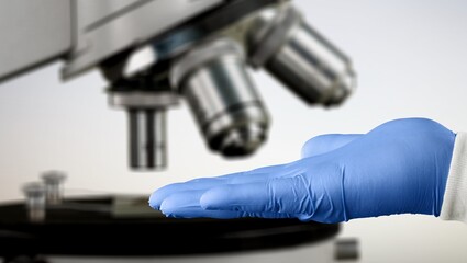 scientist prepare blood sample for research on microscope. Microscope slide. Science and medicine concept.