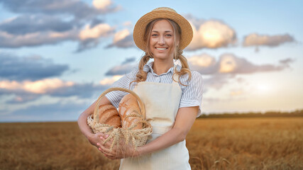 Female farmer standing wheat agricultural field Woman baker holding wicker basket bread product