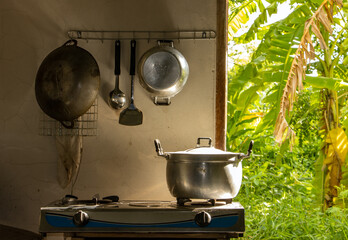 Village kitchen overlooking a tropical garden