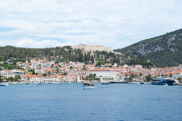 Fototapeta na wymiar Old Adriatic island town Hvar, famous touristic destination, view from the sea