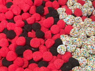 Multicolor jelly berries in sweet-shop, background