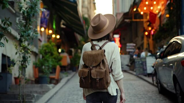 Young traveler with brown backpack on vacation in Istanbul, Turkey
