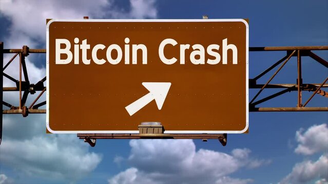 A view of a hypothetical "Bitcoin Crash" brown exit overhead road sign over a time lapse cloudscape. Bear market concept.	