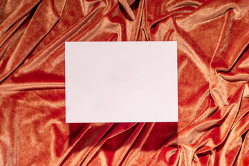 Creative modern podium background, color draped velvet fabric and empty white tiles, top view