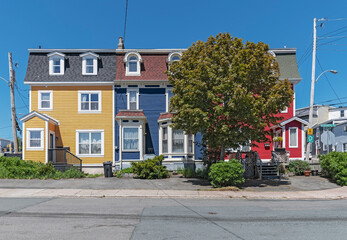 Three colorful St. John’s town houses, commonly called jelly bean houses
